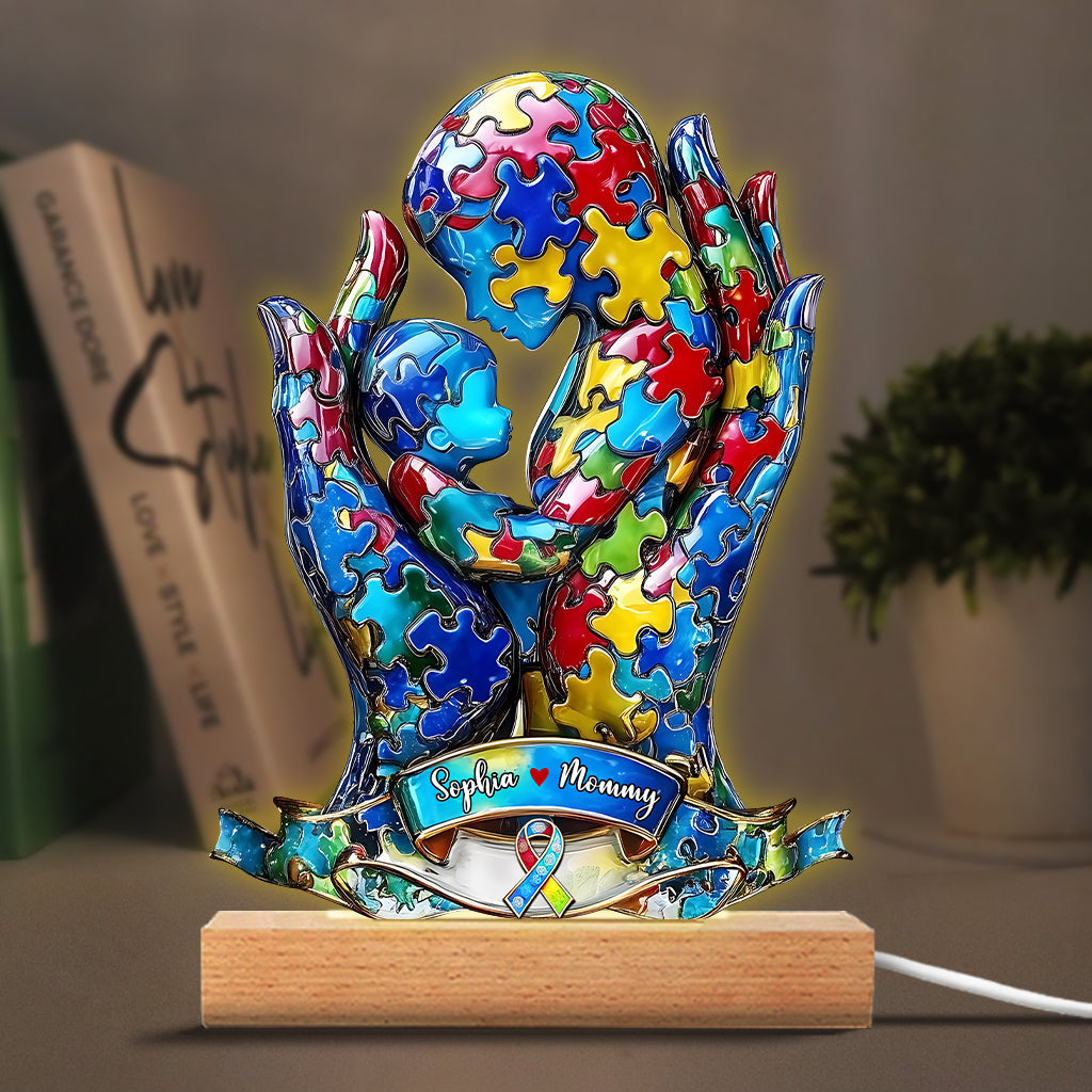 Mutter und Kind – Personalisierte, tafelförmige Leuchtbasis zur Sensibilisierung für Autismus