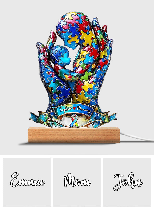 Mutter und Kind – Personalisierte, tafelförmige Leuchtbasis zur Sensibilisierung für Autismus