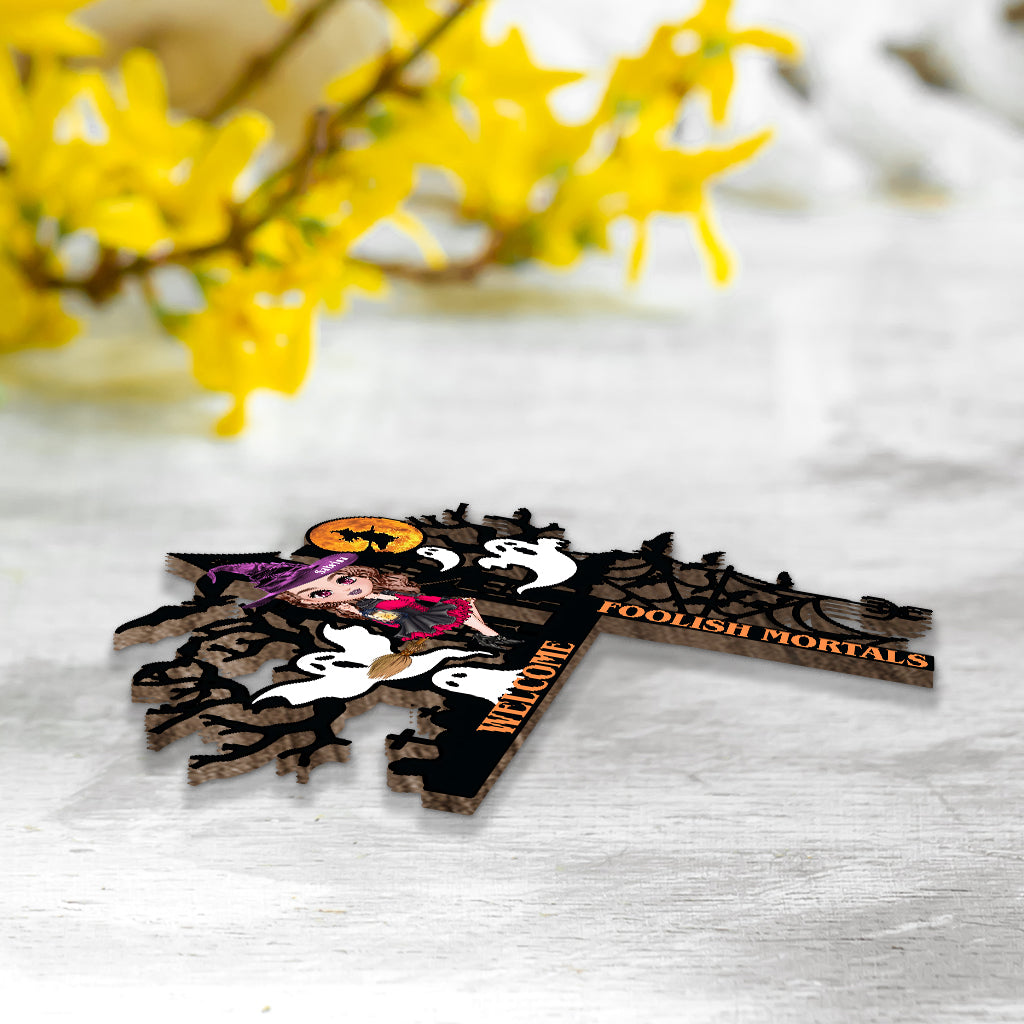 Willkommen, ihr törichten Sterblichen – Personalisierte Türrahmendekoration im Hexenstil