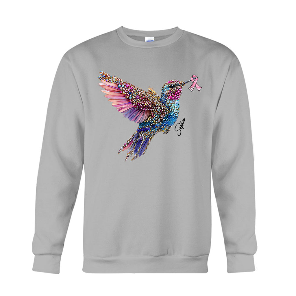 Crystal Hummingbird Pink Ribbon – Personalisiertes T-Shirt und Hoodie zur Sensibilisierung für Brustkrebs