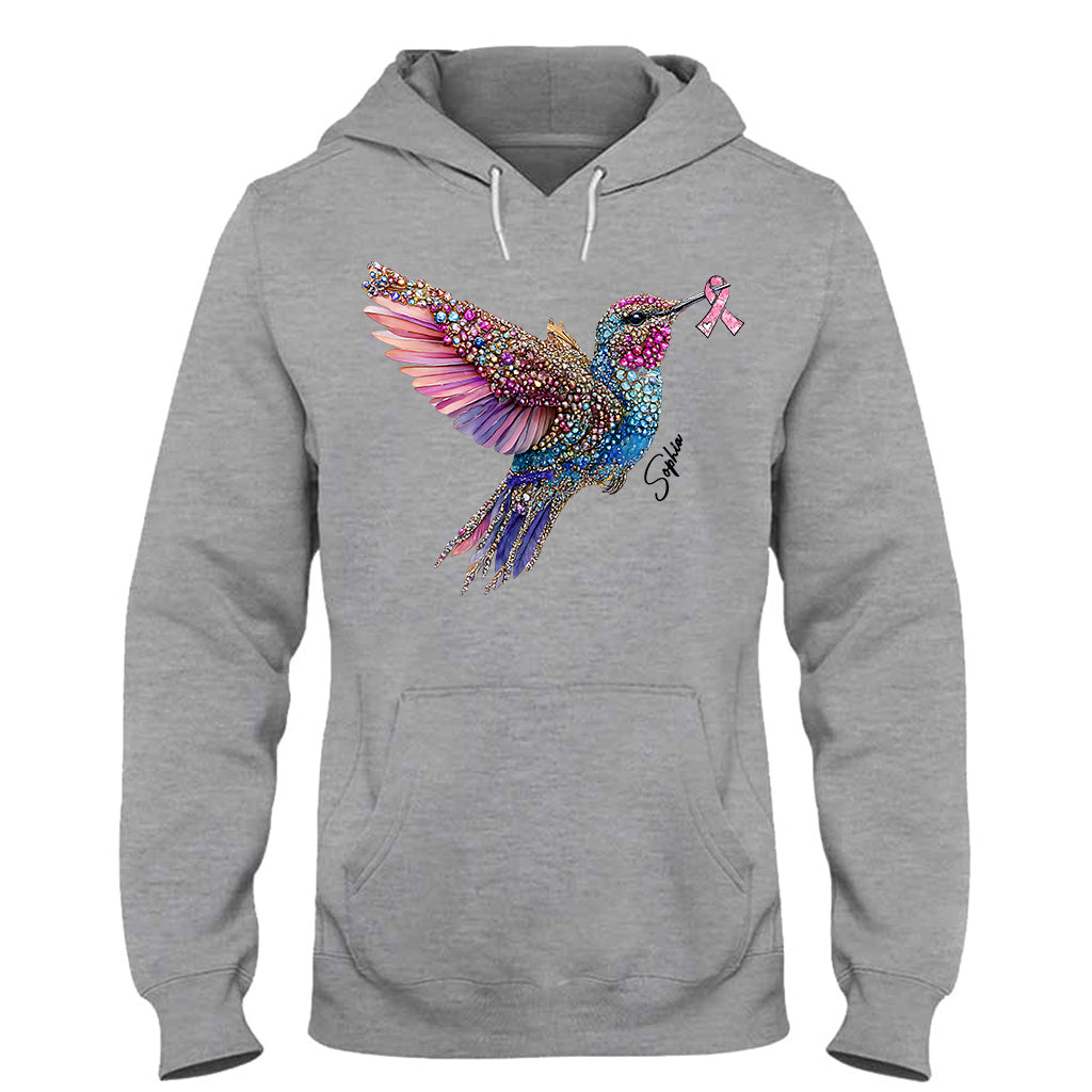 Crystal Hummingbird Pink Ribbon – Personalisiertes T-Shirt und Hoodie zur Sensibilisierung für Brustkrebs