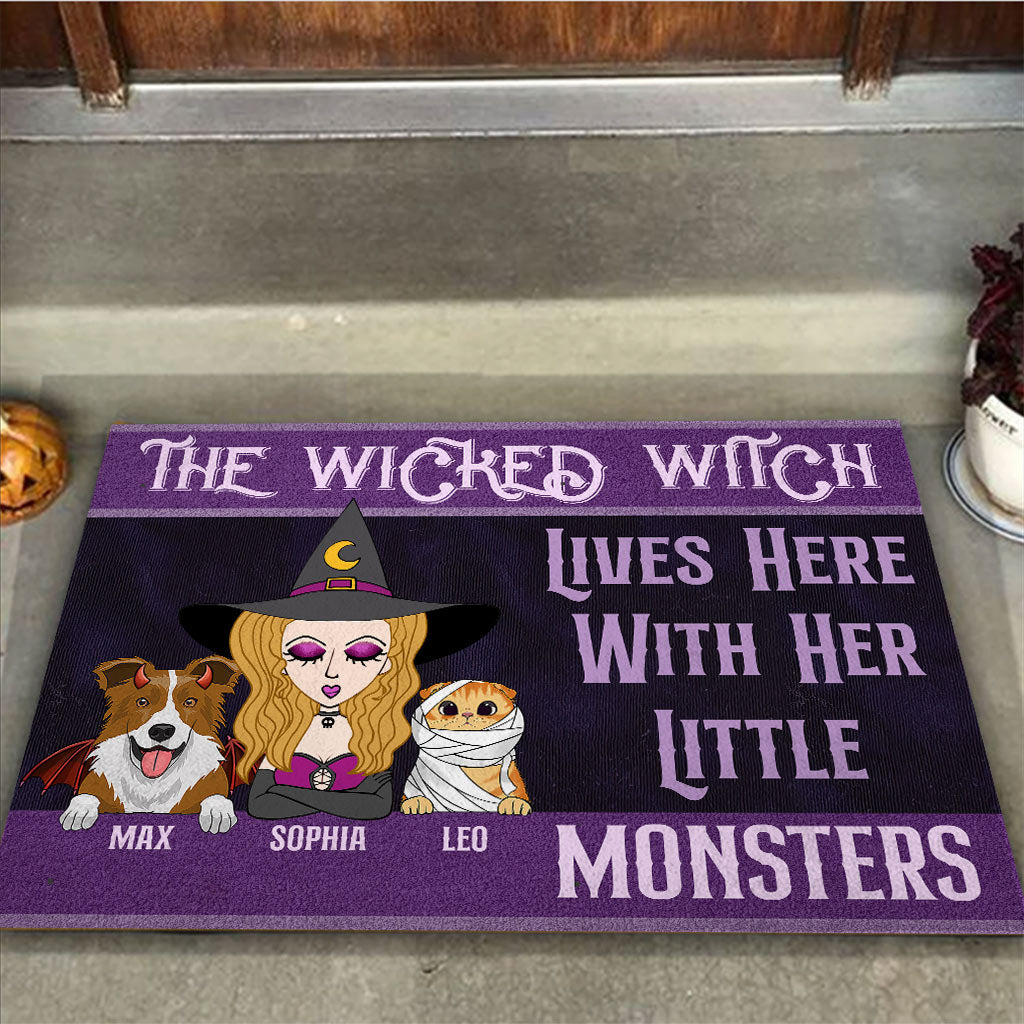 The Wicked Witch Lives Here Witrh Her Little Monsters - Personalized Dog Doormat
